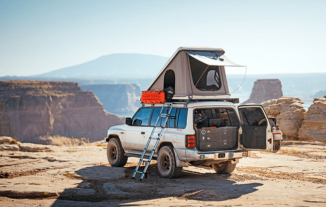 Roof Top Tents withred and gray jeep