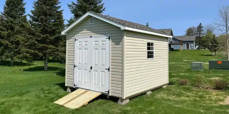 small storage shed at the back of the house